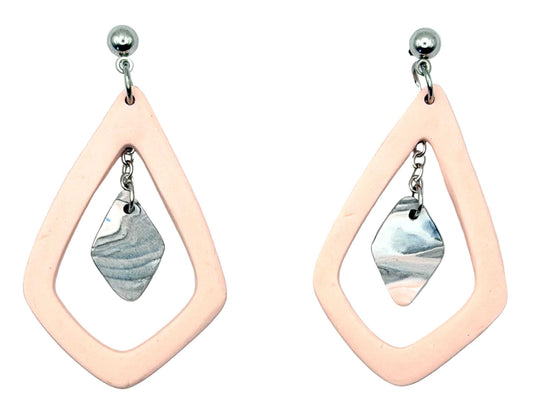 A pair of handmade dangle earrings featuring a peach-pink geometric frame with a silver-toned marbled stone charm, shown on a light textured background.
