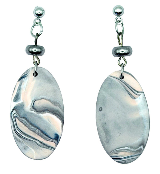 A pair of silver-toned dangle earrings with oval marbled stone pendants in white, gray, and blue, shown on a plain white background.